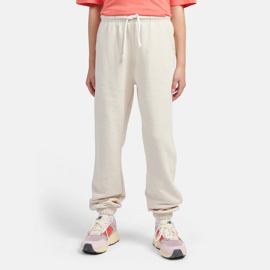 Zdjęcie produktu Spodnie dziecięce New Balance LAKG0058LIN – beżowe