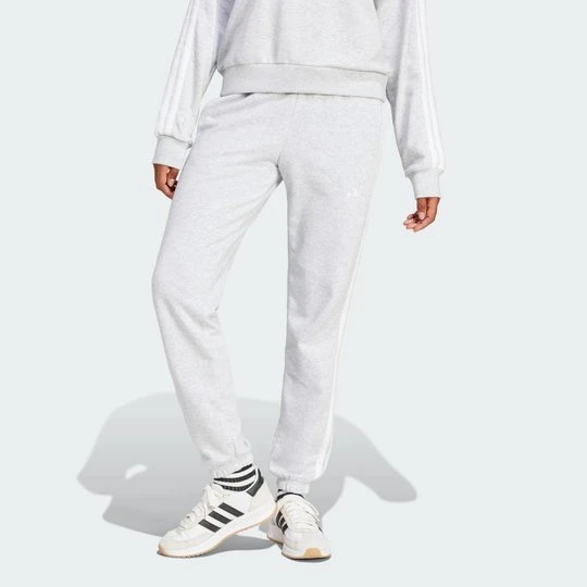 Zdjęcie produktu Spodnie Essentials 3-Stripes French Terry Cuffed Adidas