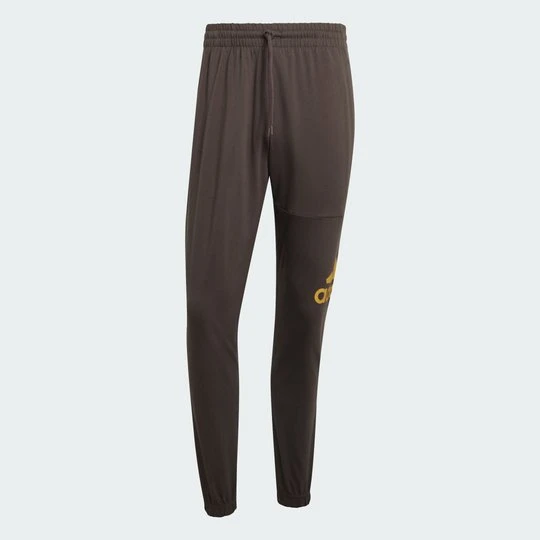 Zdjęcie produktu Spodnie Essentials Single Jersey Tapered Badge of Sport Adidas Charcoal