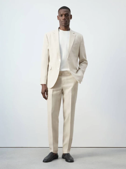Zdjęcie produktu Spodnie garniturowe Amalfi slim fit z 100% lnu kremowy / écru - Mężczyzna - - MANGO MAN beżowy