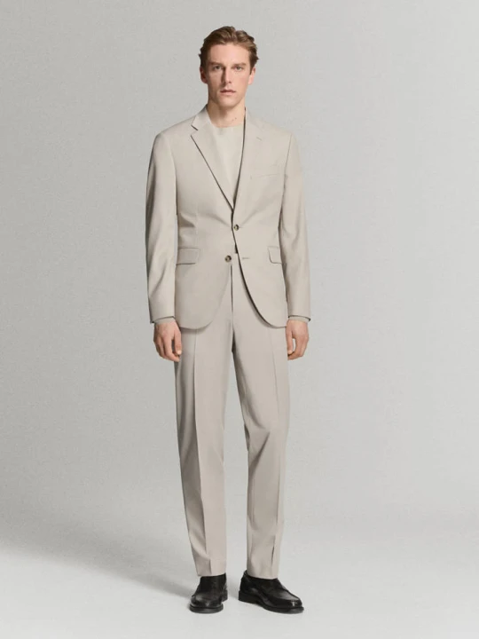 Zdjęcie produktu Spodnie garniturowe Milan slim fit beżowy - Mężczyzna - MANGO MAN