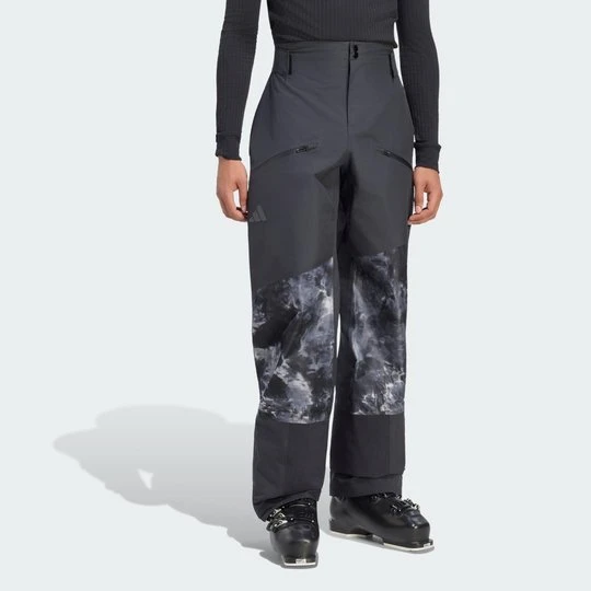 Zdjęcie produktu Spodnie hybrydowe Terrex Xperior Primeknit Spray Dye CLIMAPROOF+ Adidas czarny