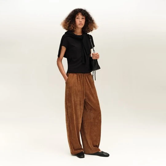 Zdjęcie produktu Spodnie jogger lejący sztruks karmelowe BIMBA Y LOLA CARAMEL