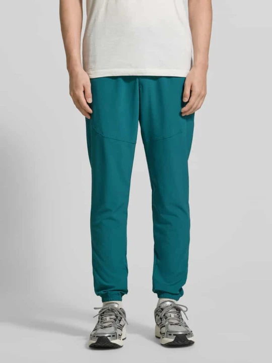 Zdjęcie produktu Spodnie jogger o kroju regular fit z nadrukiem z logo model 'Vibe' Under Armour Petrol