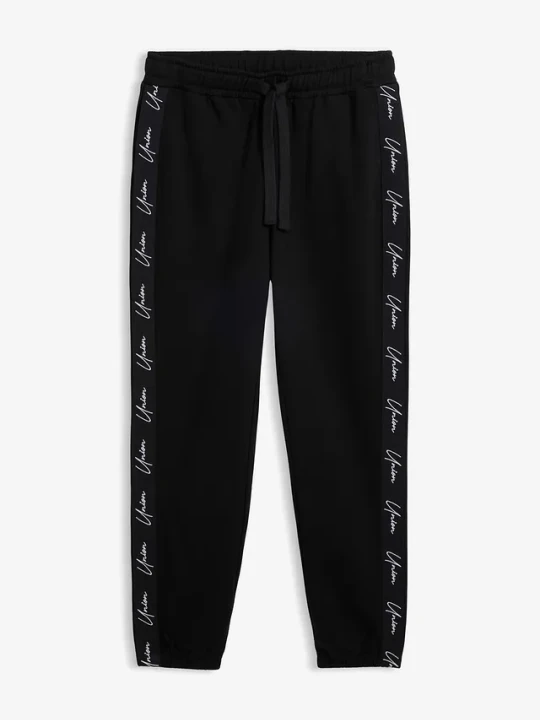 Zdjęcie produktu Spodnie joggingowe z czystej bawełny organicznej o kroju loose fit BonPrix czarny