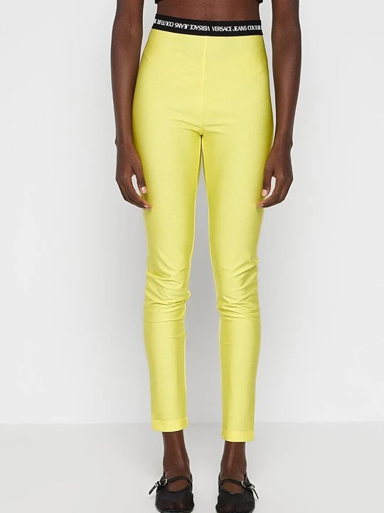 Zdjęcie produktu Spodnie legginsy Versace Jeans Couture żółty