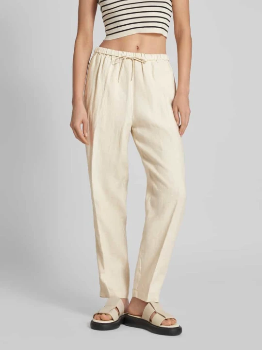 Zdjęcie produktu Spodnie lniane o kroju tapered fit w kant model ‘CASUAL LINEN’ Tommy Hilfiger Piaskowy