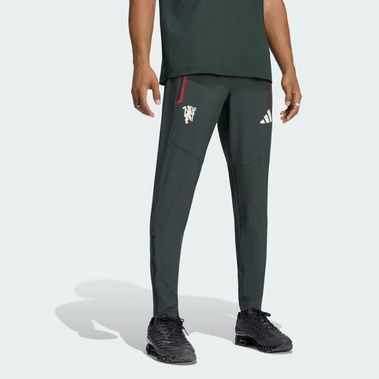 Zdjęcie produktu Spodnie Manchester United Tiro Tech Adidas Jungle Ink
