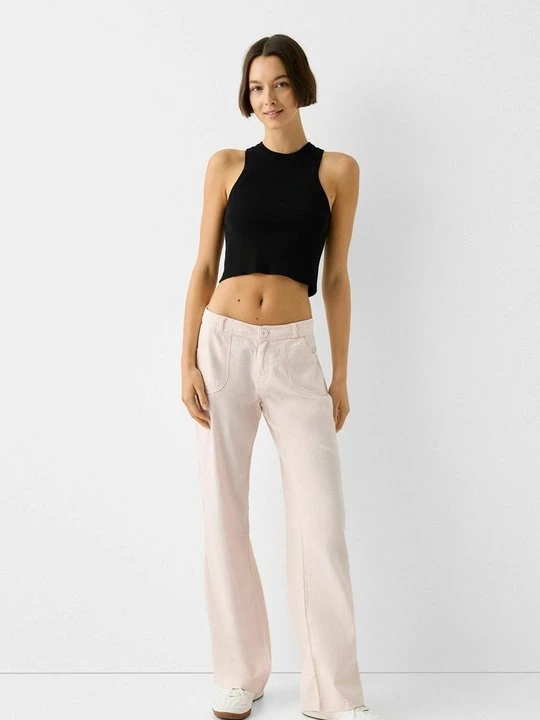 Zdjęcie produktu Spodnie materiałowe Bershka różowy