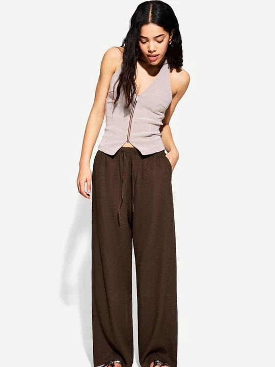 Zdjęcie produktu Spodnie materiałowe Bershka ciemnobrązowy