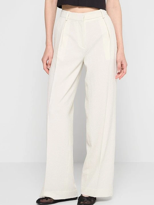 Zdjęcie produktu Spodnie materiałowe Calvin Klein mleczny