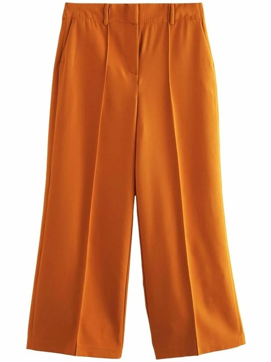 Zdjęcie produktu Spodnie materiałowe Next pomarańczowy