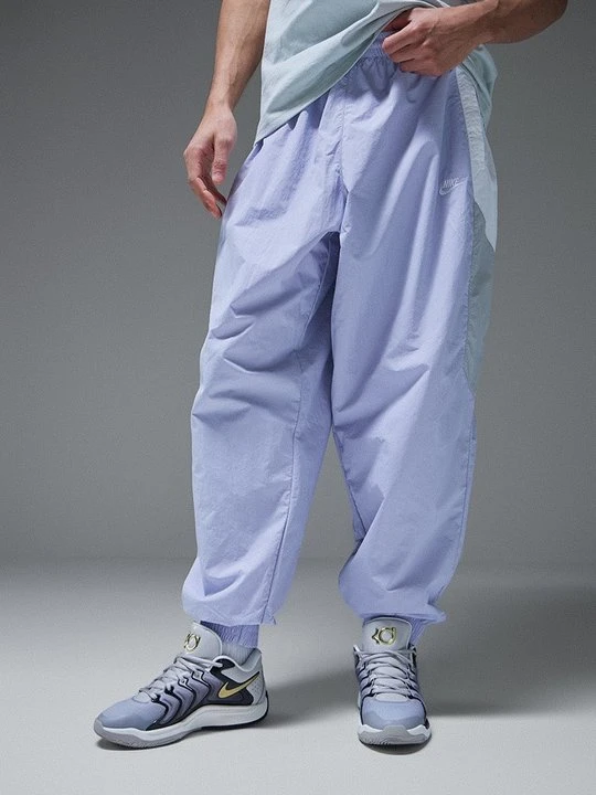 Zdjęcie produktu Spodnie materiałowe Nike biały