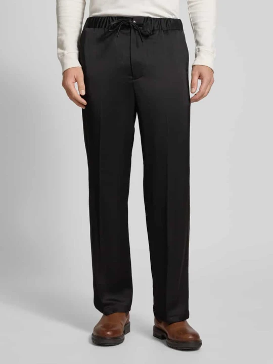 Zdjęcie produktu Spodnie materiałowe o kroju relaxed fit z naszywką z logo Scotch & Soda Czarny