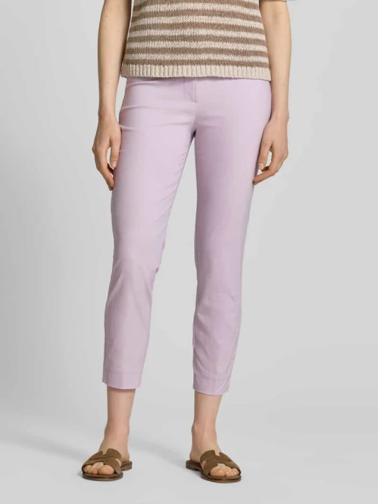 Zdjęcie produktu Spodnie materiałowe o kroju slim fit w skróconym kroju Christian Berg Lawendowy
