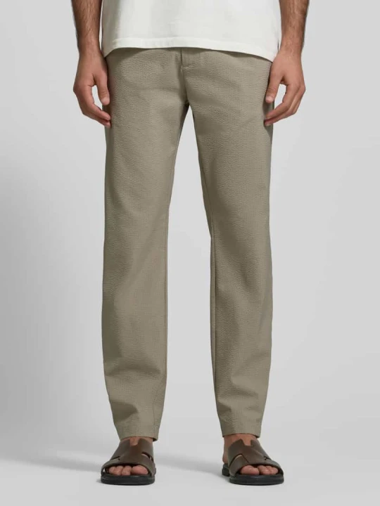Zdjęcie produktu Spodnie materiałowe o kroju slim fit z fakturowanym wzorem CRUNA Ciemnozielony