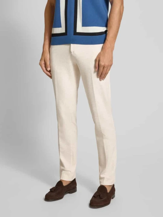 Zdjęcie produktu Spodnie materiałowe o kroju slim fit z kieszeniami z tyłu model ‘Mott’ Scotch & Soda Złamany biały melanż