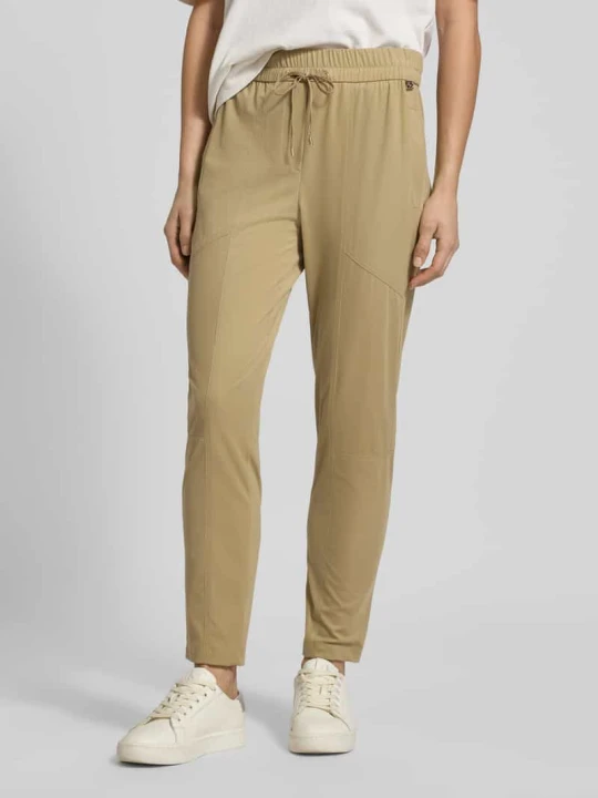 Zdjęcie produktu Spodnie materiałowe o kroju slim fit z kieszeniami zapinanymi na zamek błyskawiczny Marc Cain Piaskowy
