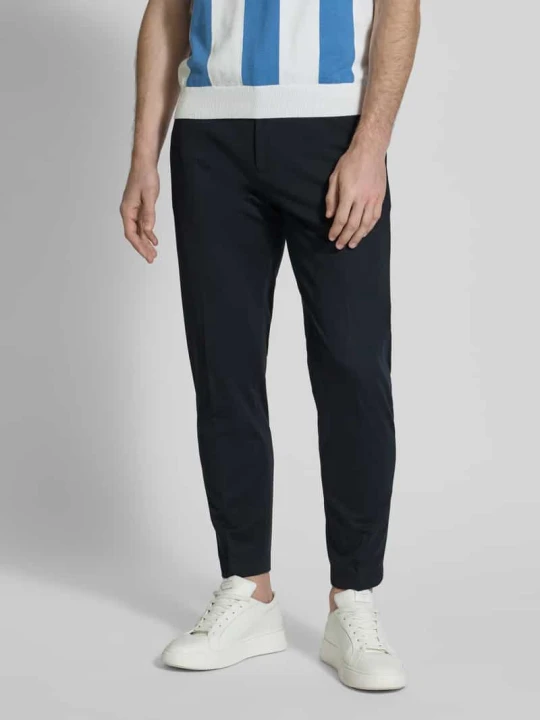 Zdjęcie produktu Spodnie materiałowe w kroju slim fit z zaprasowanymi kantami model 'JUNO' CINQUE Granatowy