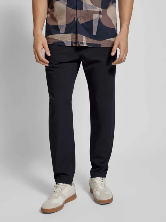 Zdjęcie produktu Spodnie materiałowe w kroju tapered fit z tunelem MCNEAL Granatowy