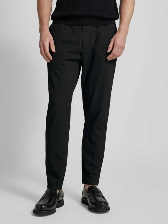 Zdjęcie produktu Spodnie materiałowe w kroju tapered fit z tunelem MCNEAL Czarny
