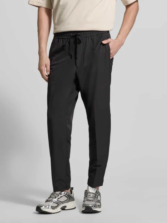 Zdjęcie produktu Spodnie materiałowe o kroju tapered fit z tunelem model 'T_FLEX' Boss Czarny
