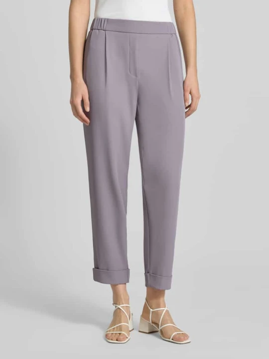 Zdjęcie produktu Spodnie materiałowe o kroju tapered fit z zakładkami w pasie Jake*s Lawendowy