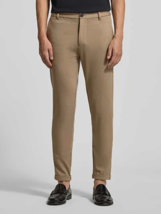 Zdjęcie produktu Spodnie materiałowe o skróconym kroju z wpuszczanymi kieszeniami w stylu francuskim lindbergh Piaskowy