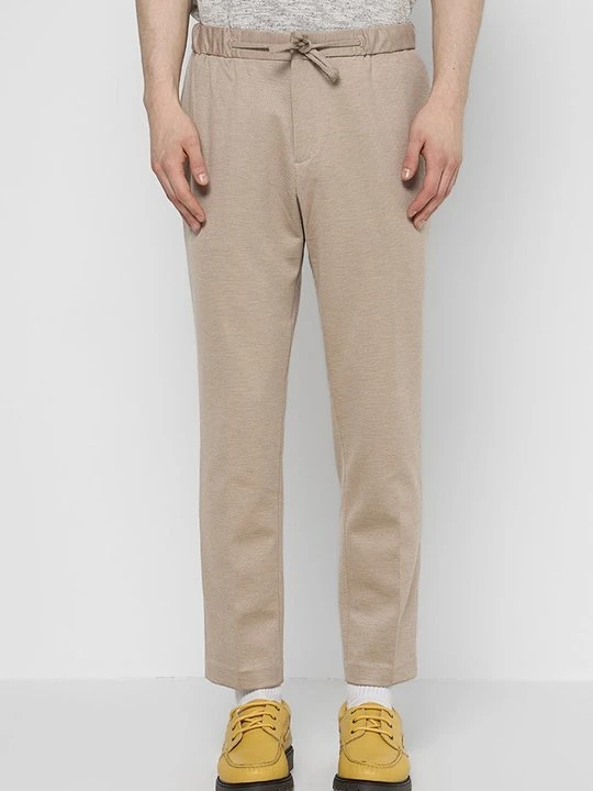Zdjęcie produktu Spodnie materiałowe Scotch & Soda beżowy