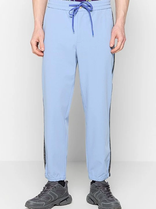 Zdjęcie produktu Spodnie materiałowe Versace Jeans Couture jasnoniebieski