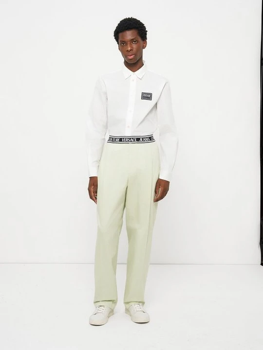Zdjęcie produktu Spodnie materiałowe Versace Jeans Couture beżowy