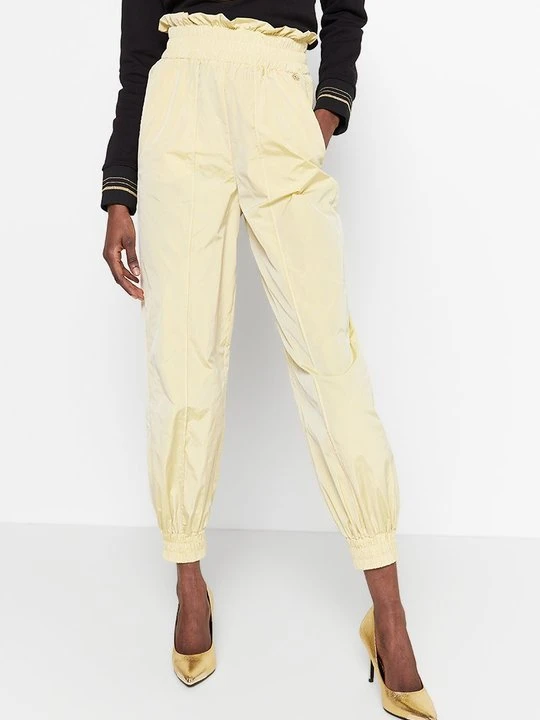 Zdjęcie produktu Spodnie materiałowe Versace Jeans Couture żółty neon