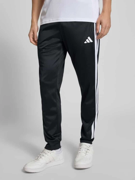 Zdjęcie produktu Spodnie materiałowe z elastycznym pasem i kieszeniami z tyłu Adidas Czarny