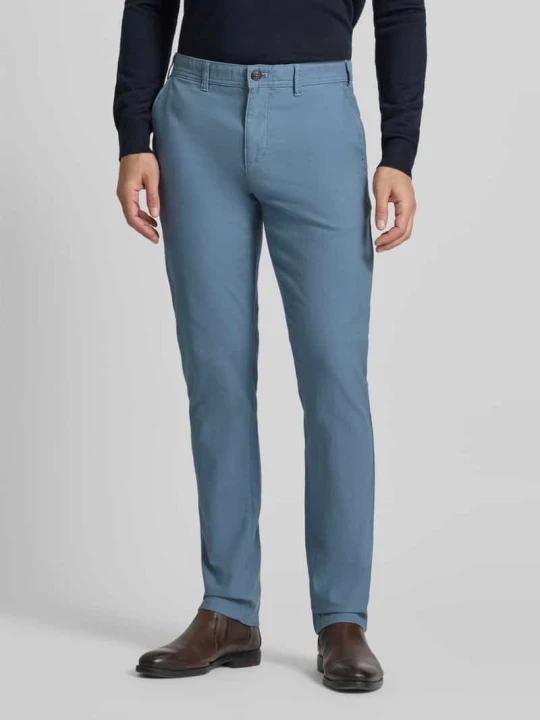 Zdjęcie produktu Spodnie materiałowe o kroju slim fit z kieszeniami z tyłu MCNEAL Błękitno-niebieski