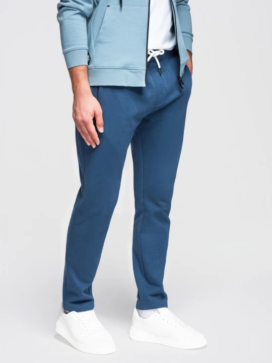Zdjęcie produktu Spodnie męskie bawełniane dresowe BASIC z nogawką bez ściągacza - ciemnoniebieskie V4 - Rozmiar: XL Ombre Clothing
