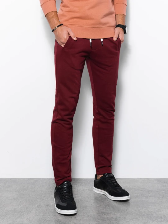 Zdjęcie produktu Spodnie męskie dresowe bez ściągacza na nogawce - burgundowe V2 - Rozmiar: M Ombre Clothing czerwony