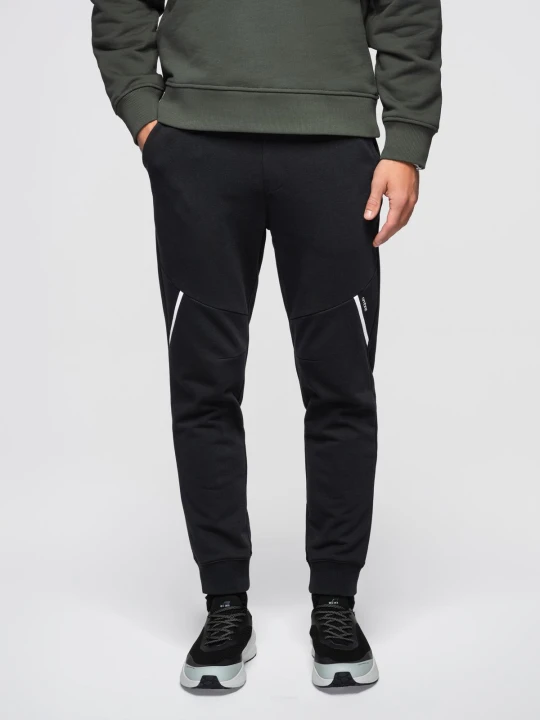 Zdjęcie produktu Spodnie męskie dresowe joggery - czarne V2 Ombre Clothing