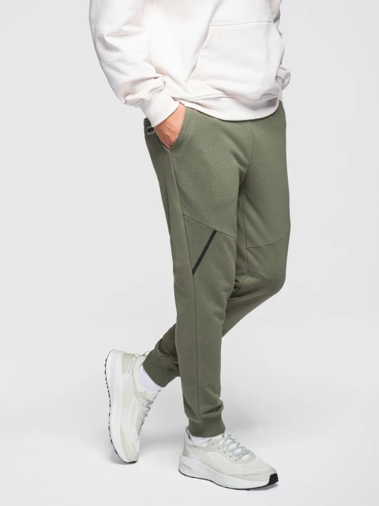 Zdjęcie produktu Spodnie męskie dresowe joggery - oliwkowe V4 - Rozmiar: L Ombre Clothing oliwkowy