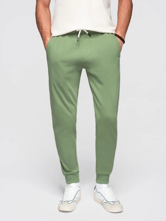 Zdjęcie produktu Spodnie męskie dresowe ze ściągaczem przy nogawce BASIC jogger - zielone V3 - Rozmiar: L Ombre Clothing