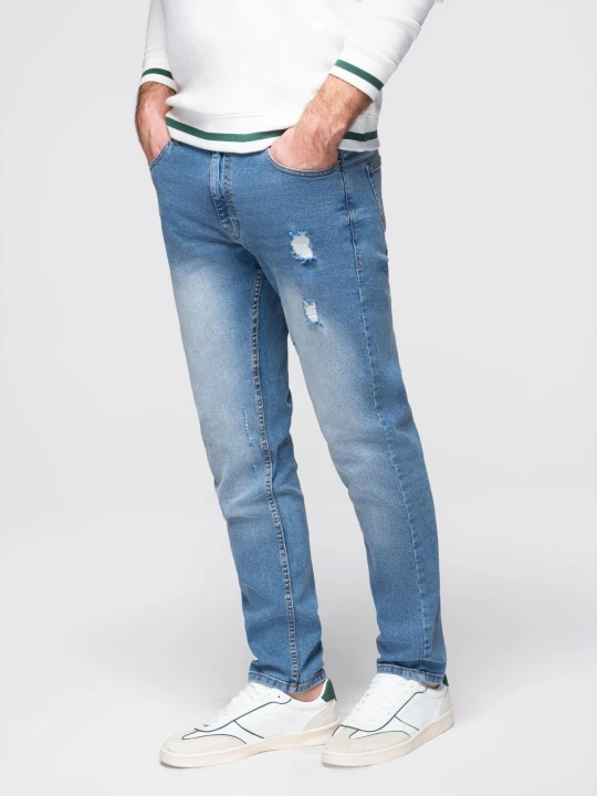 Zdjęcie produktu Spodnie męskie jeansowe REGULAR FIT z przetarciami - jasnoniebieskie V1 - Rozmiar: L Ombre Clothing