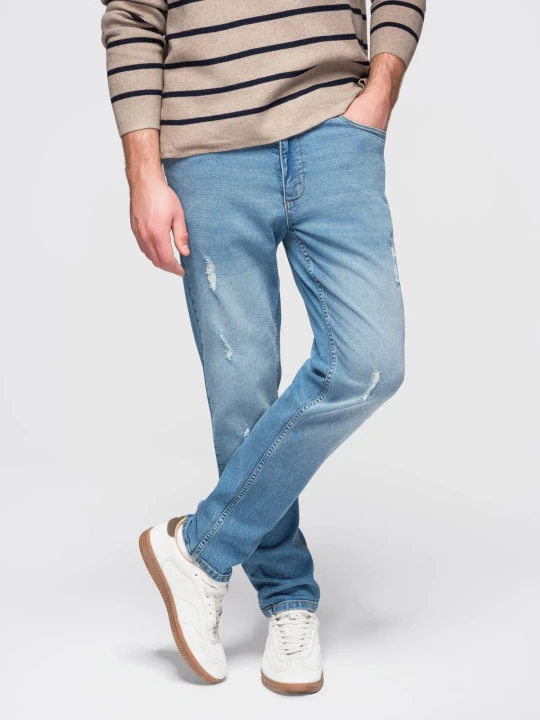 Zdjęcie produktu Spodnie męskie jeansowe SLIM FIT z przetarciami - jasnoniebieskie V1 - Rozmiar: S Ombre Clothing