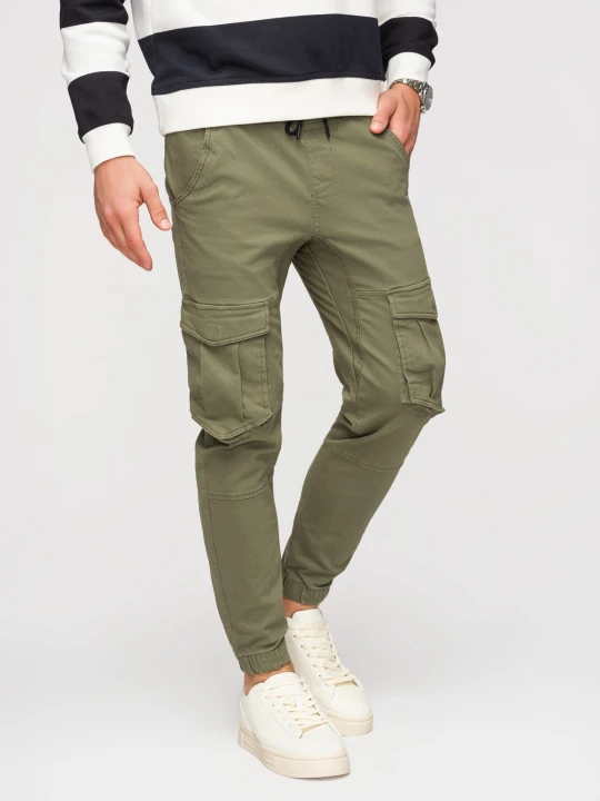 Zdjęcie produktu Spodnie męskie JOGGERY z kieszeniami cargo - oliwkowe V18 Ombre Clothing oliwkowy