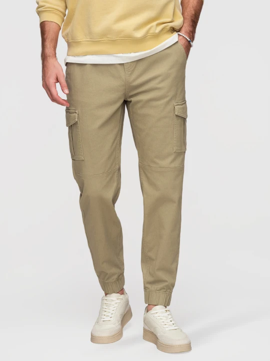 Zdjęcie produktu Spodnie męskie JOGGERY z zapinanymi kieszeniami cargo - khaki V1 - Rozmiar: S Ombre Clothing oliwkowy