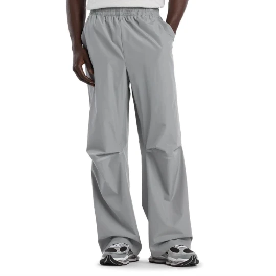 Zdjęcie produktu Spodnie męskie New Balance MB61M4DOYST - szare