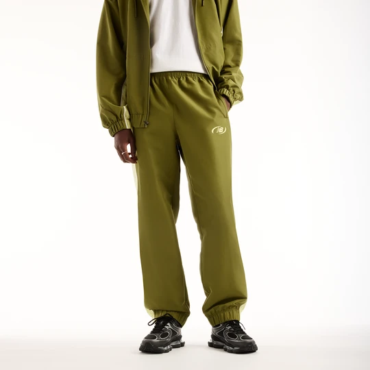 Zdjęcie produktu Spodnie męskie New Balance MB62A8LTGEE – zielone
