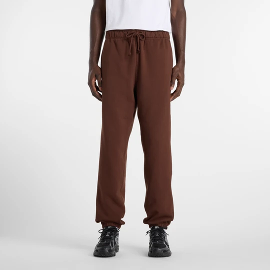 Zdjęcie produktu Spodnie męskie New Balance MP41508ABJ – brązowe