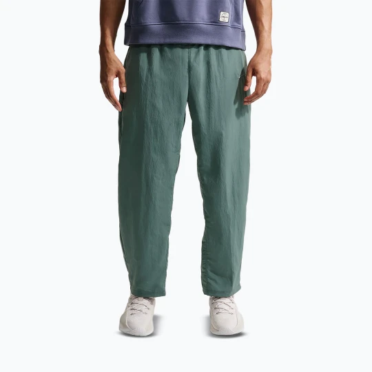 Zdjęcie produktu Spodnie męskie Nike N.A.C. Dri-Fit Woven mineral slate / pale ivory / mineral slate Zielony