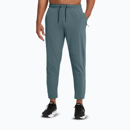 Zdjęcie produktu Spodnie męskie Nike Unlimited Dri-Fit Zippered Cuff mineral slate/black/mineral slate Niebieski