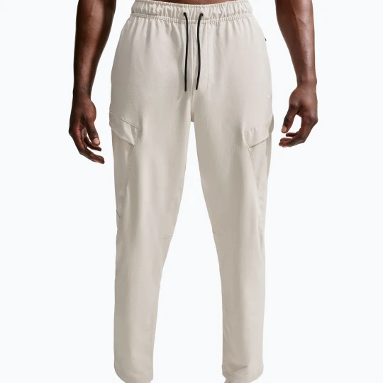 Zdjęcie produktu Spodnie męskie Nike Unlimited ight orewood brown/black/light orewood brown