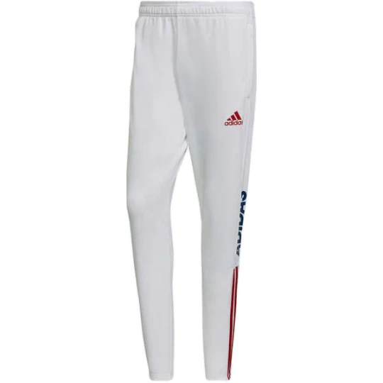 Zdjęcie produktu Spodnie dresowe męskie Tiro Wording Adidas Biały